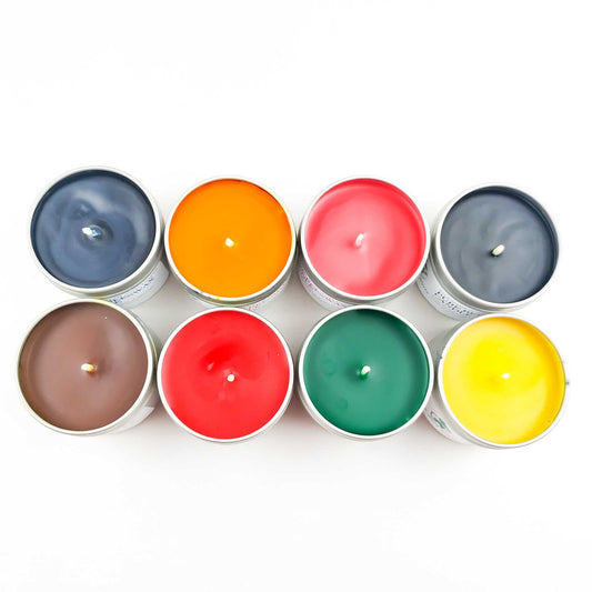 Vibrantly Colored Beeswax Candles in a Tin, Reflecting BEE Zero Waste’s Commitment to Quality and Sustainability