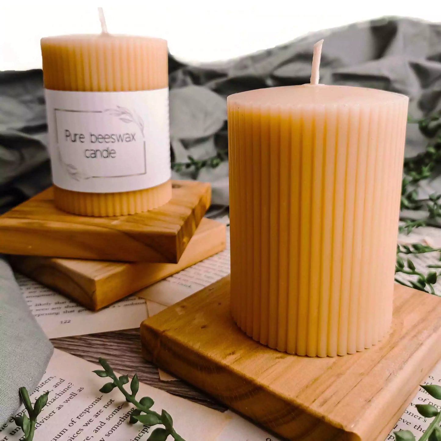 Eco-friendly, British-made fluted beeswax candle, combining elegant design with natural purity