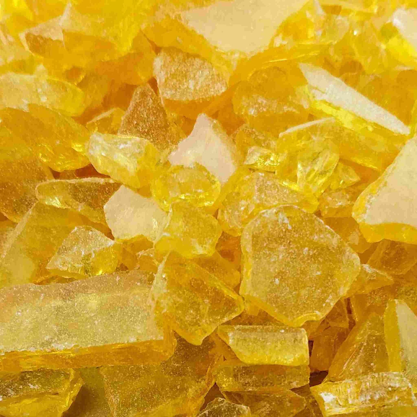 Premium Quality Pine Resin, also known as Colophony or Gum Rosin, in natural flake form, WW Grade, displayed for various eco-friendly DIY projects including beeswax wraps and furniture polish