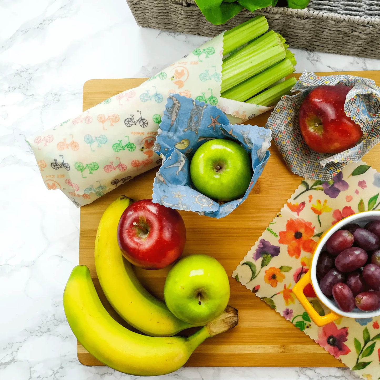 Assorted vegan wax food wraps, handmade from plant-based materials, showcasing eco-friendly kitchen essentials on a wooden table