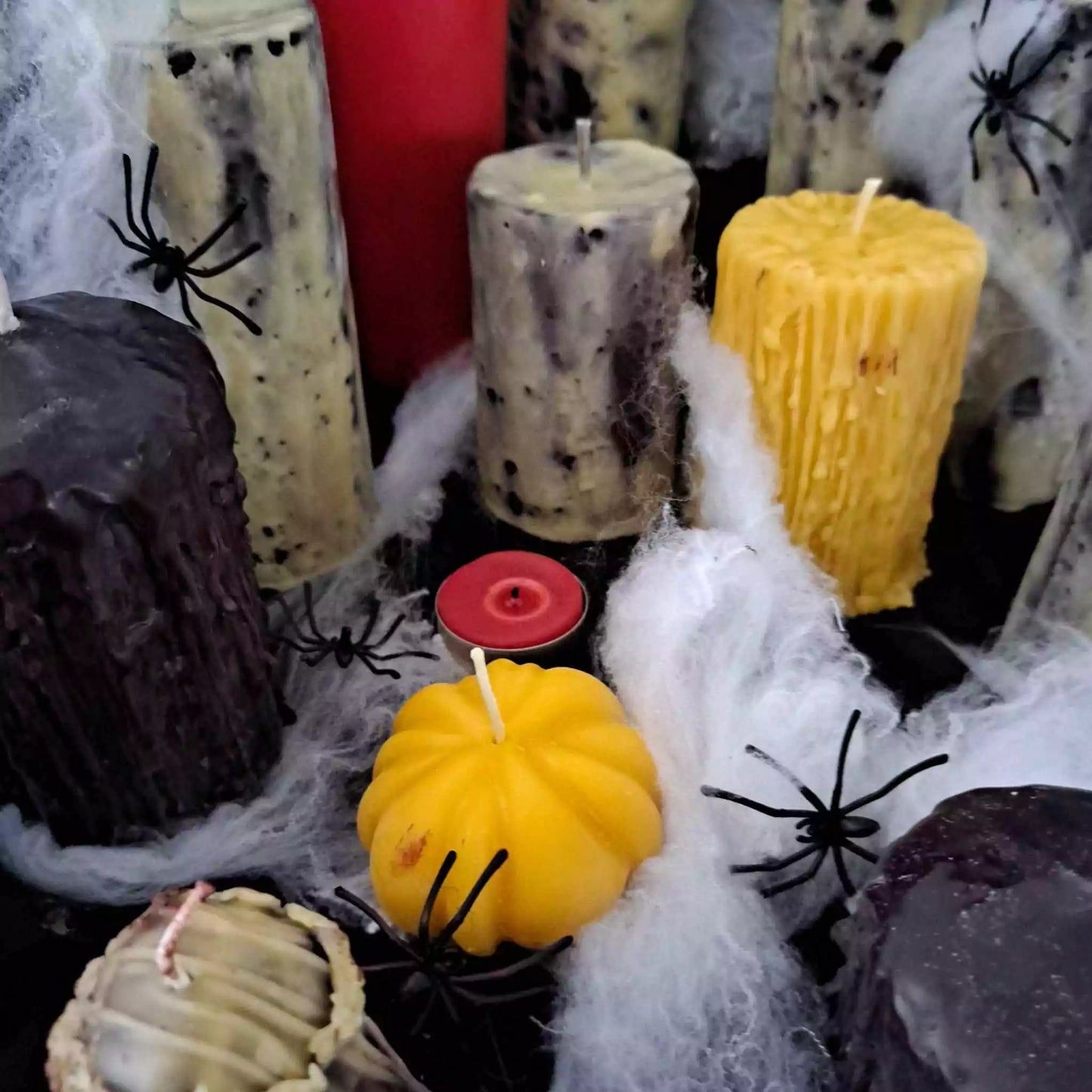 Eco-friendly Halloween pumpkin beeswax candle, illuminating fall nights with a warm, natural glow and sustainable elegance