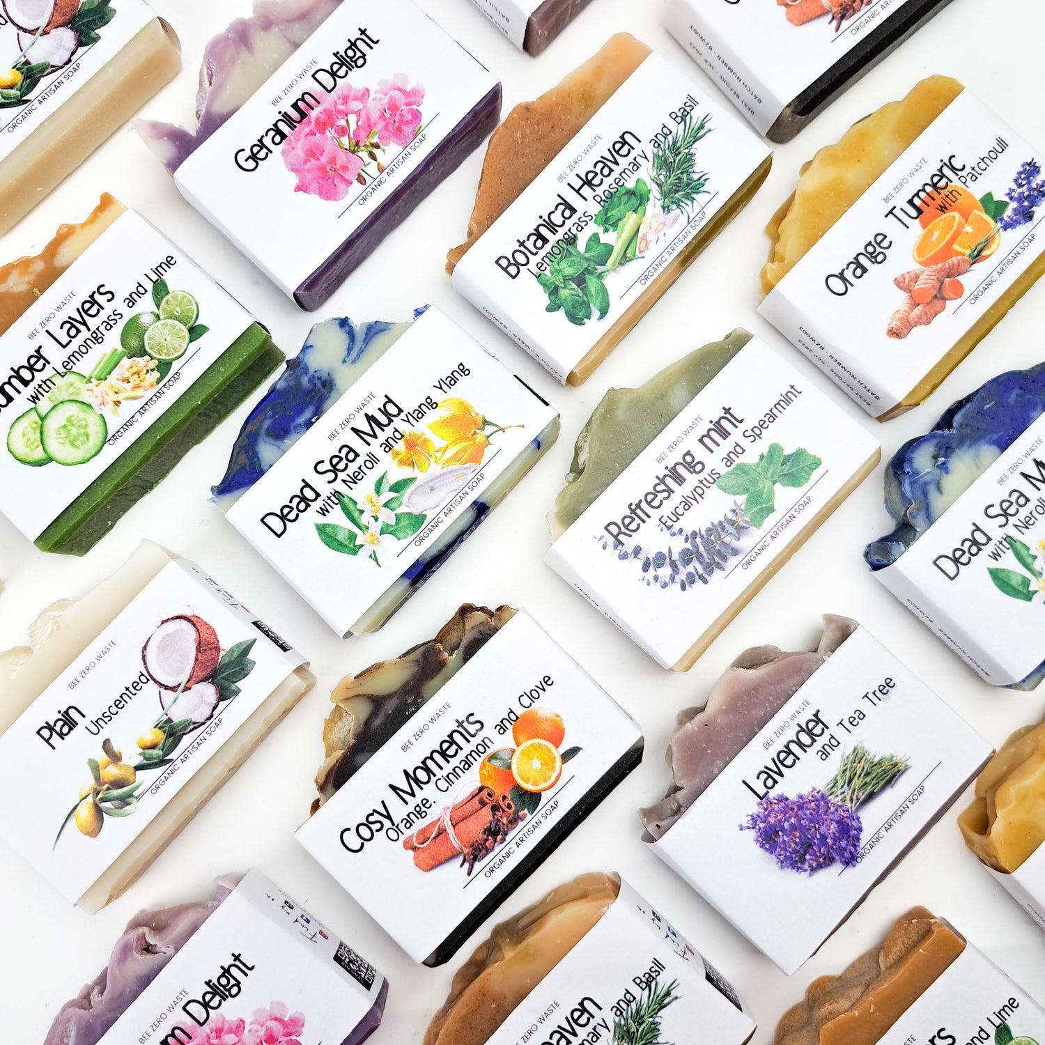 Handcrafted natural soaps with botanicals, cold-processed and scented with essential oils, displayed on a rustic wooden surface, highlighting their organic beauty
