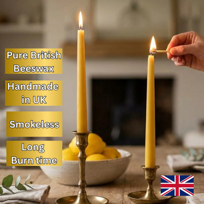 Lit natural beeswax taper candle in a classic holder creating a cozy and luxurious evening ambiance.
