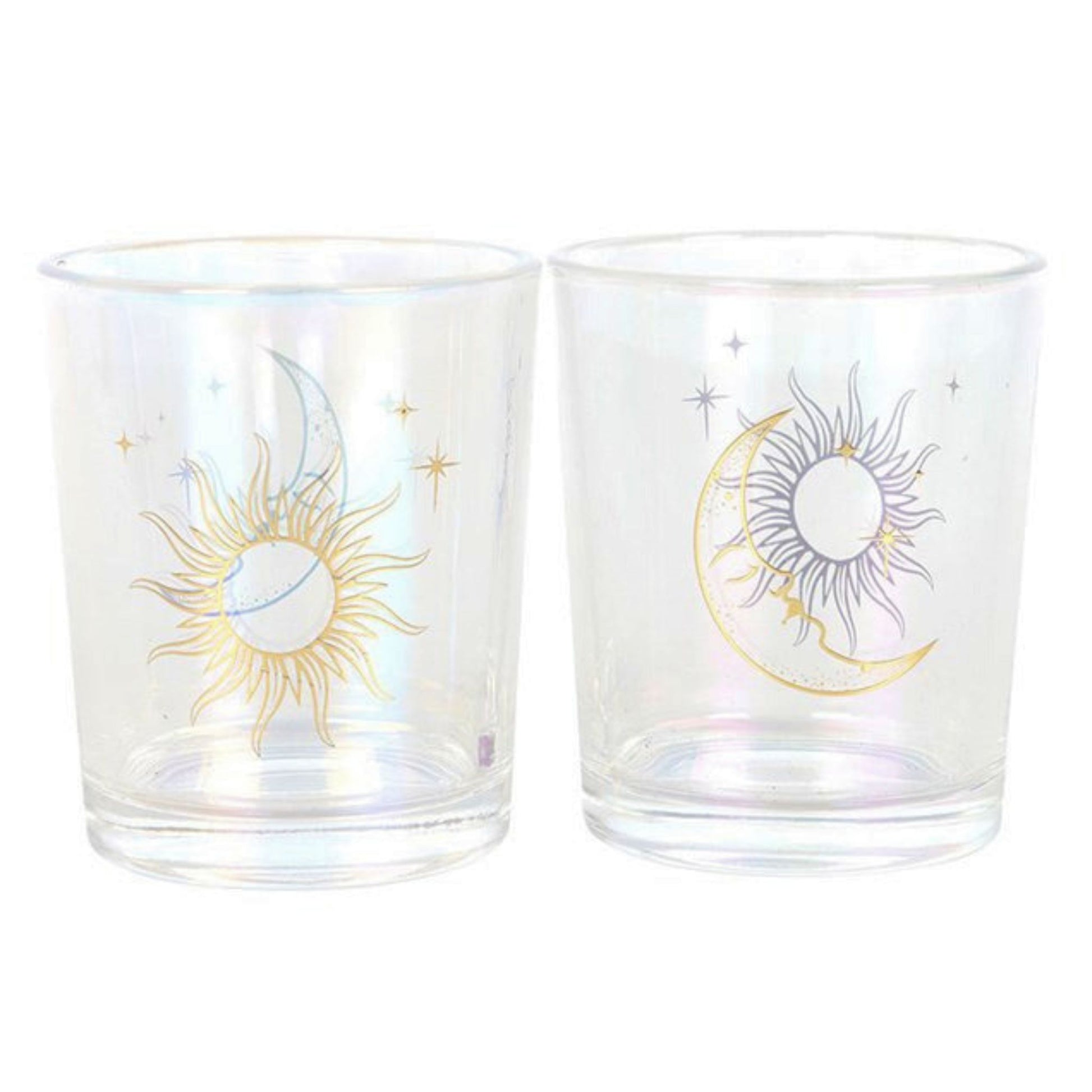 Set of two iridescent glass sun and moon votive candle holders lit with natural yellow beeswax candles on a dark, mystical background.