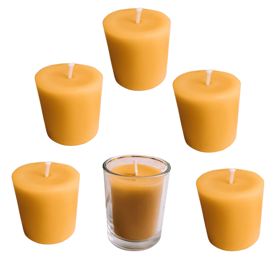 Pure beeswax votive candles emitting a bright, even flame, handcrafted for long-lasting burn, perfect for ambient lighting